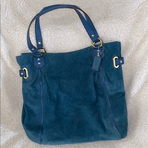 Teal blue suede coach purse with gold accents